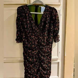 Floral ruched dress NWT -light material with lining. Never worn-